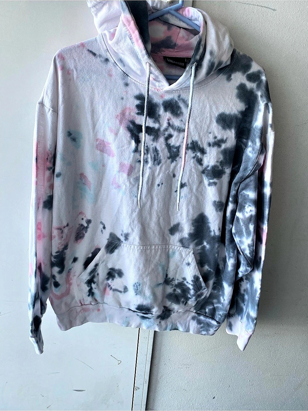 Chemistry Tie-Dye Hoodie in White & Black with I ting of pink.